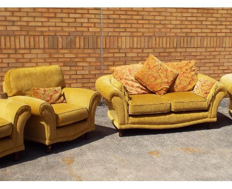 A good quality two seater sofa and a single armchair, gold coloured upholstery - included in the lot are a selection of scatt