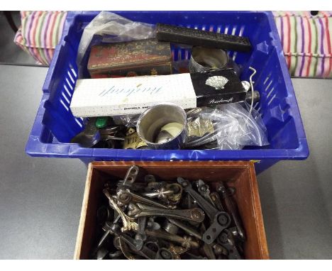 A good mixed lot to include cast iron carpet grips by Alexander, brass ware, plated ware,  a J.A.Henckels razor and similar 