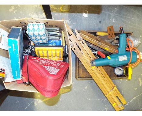 A good mixed lot to include various tools, first aid kit, Black and Decker drill, easel and a large collection of hand tools 