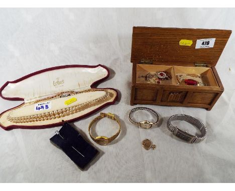 A jewellery box containing a small collection of costume jewellery, lady's Tissot wrist watch, Reflex wrist watch, Pulsar exp