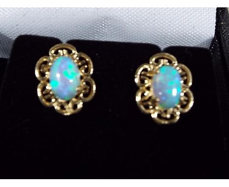 A pair of lady's 9ct gold opal earrings