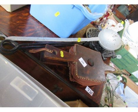 A set of bellows, a waffle iron, and a large ladle