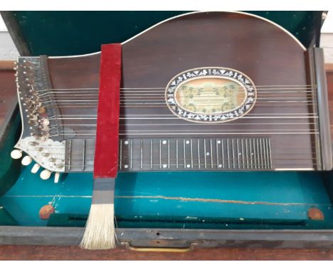 A late 19th/early 20th Century Meinel &amp; Herold Klingenthal zither with mother of pearl inlay A/F in case. Location:A1F 