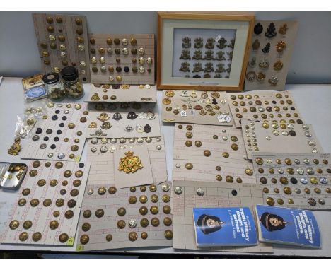 A collection of early 20th century and later British military cap badges and buttons to include the parachute regiment, SAS, 