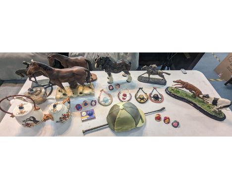 A collection of equestrian related items to include a riding cup and crop, model horses and horse racing ornaments, fox hunti