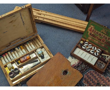 A Victorian Windsor & Newton mahogany cased artist box with contents, a vintage artist easel and box containing paints and ot