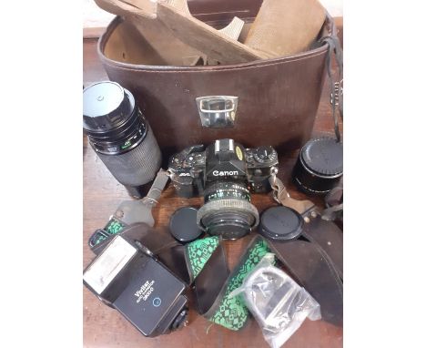 A vintage Canon camera with lenses and accessories in travel case A/F. Location:RWM 
