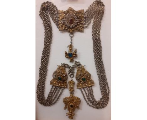 A 20th Century Yugoslavian silver coloured and gold coloured multi-chain necklace set with coloured glass cabochons, mounted 
