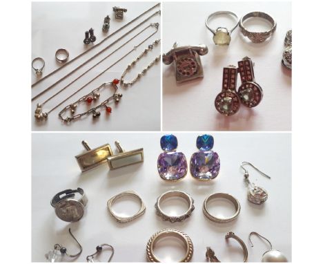 A quantity of modern and vintage silver jewellery to include pendants and chain necklaces together with a pair of Butler &amp