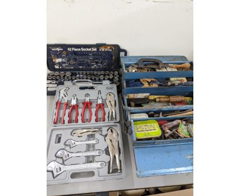 A collection of various tools to include a 42-piece socket set, a second set to include three adjustable spanners, pliers and