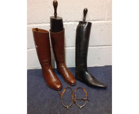 A pair of vintage brown leather riding boots (11" toe to heel and 4" at widest point of soles) together with a pair of ebony 