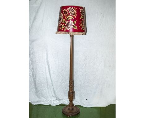 A standard lamp and shade