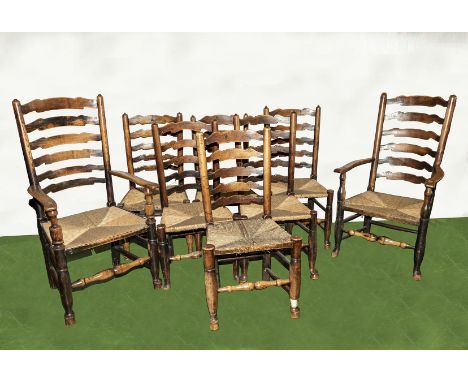 Six 19th century ladder back rush seated chairs and two carvers