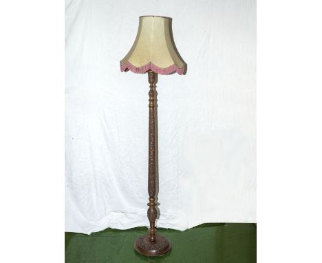 A standard lamp and shade