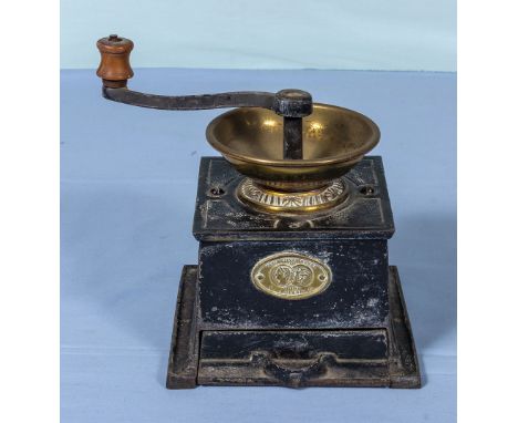 A vintage coffee grinder