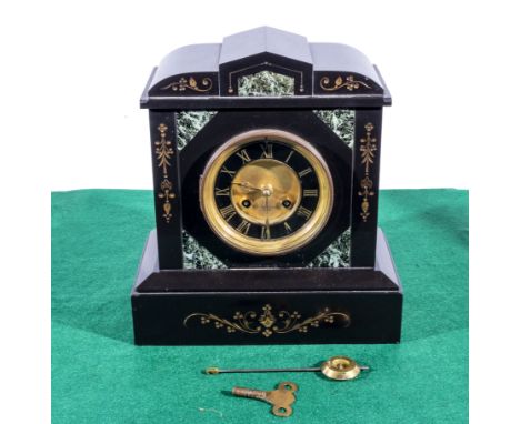 A slate and marble mantle clock with brass dial