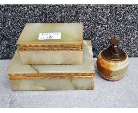 Onyx items: cigarette and cigar case and a table lighter.
