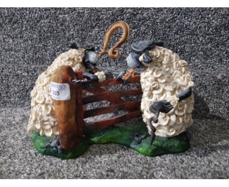 A humorous sheep group "The Five-baa Gate" by Philip Struttard for Enesco Ltd.