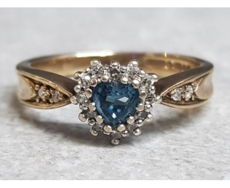 9ct yellow gold topaz &amp; diamond ring, heart shaped topaz surrounded by small diamonds and 2 more diamonds on each shoulde