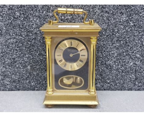 Large and heavy brass mechanical carriage clock the face marked 'Du Chateau'.