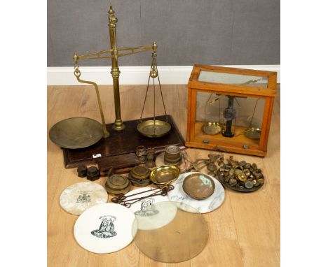 A collection of scales and weights to include pottery scale discs, one for Avery LimitedCondition report: At present, there i