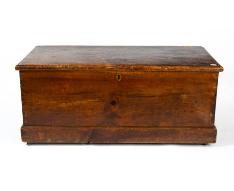 A 19th century pine trunk or box with iron carrying handles to the side, 117cm wide x 52cm deep x 52cm highCondition report: 