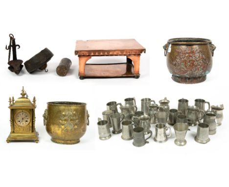 A late 19th century brass mantle clock, 18cm wide x 30cm high; a collection of pewter tankards; a Boyds patent copper warming