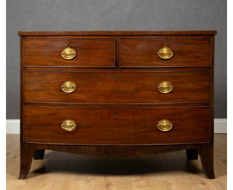 A 19th century mahogany bow front chest of three long drawers with splayed bracket feet, 108cm wide x 53cm deep x 81cm highCo