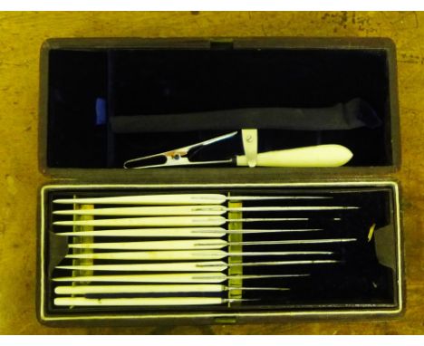 A 19th Century leather cased set of scalpels, the blades stamped Weiss London, the hinged lid bearing a white metal plaque in