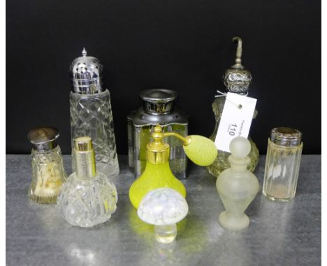 A mixed lot to include an Epns and cut glass castor, an EPBM caddy and cover, a collection of four scent bottles to include C