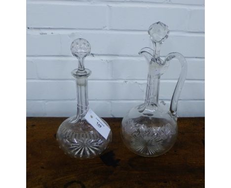 A Globe and Shaft etched decanter and stopper, together with another with a loop handle to side, (2) 
