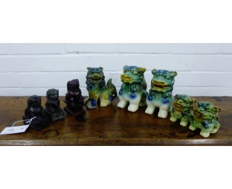 A collection of five ceramic glazed temple lions together with two hardstone examples and one resin, tallest 15cm (8) 