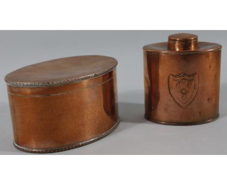 A Regency style copper caddy, of oval form, with compressed lid and shield front marked JS & S, 14cm high, and a Sheffield pl