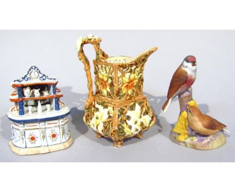 Various 20thC china, to include a Royal Worcester bird group Linnets, no. 8365, 13cm high, a W Zsolnay, pierced jug, etc. (3)
