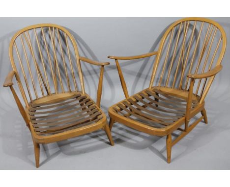 A pair of modern Ercol light wood open arm chairs, with cane backs and squat supports, 70cm wide. (2)