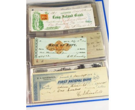 An album of various bank notes, cheques, Bloomsburg Banking Company Bank of Espy, various other notes, some dated 19thC, 1898