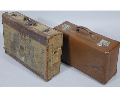 A leather finish travelling case, with chrome mount, 18cm high, 60cm wide, 36cm deep, and an Army and Navy luggage trunk with