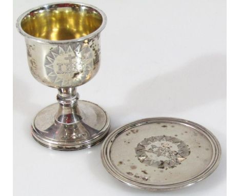 A Victorian silver travelling communion set, comprising miniature goblet and wafer plate, 6cm diameter, Birmingham 1842, 1½oz