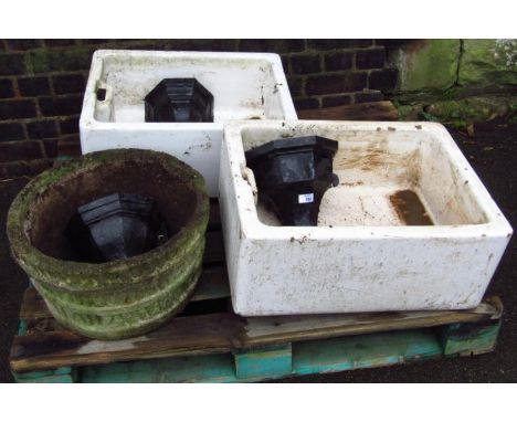 Three various metal drain hoppers, painted black, 26cm high, a stone planter and two Belfast sinks. (a quantity)