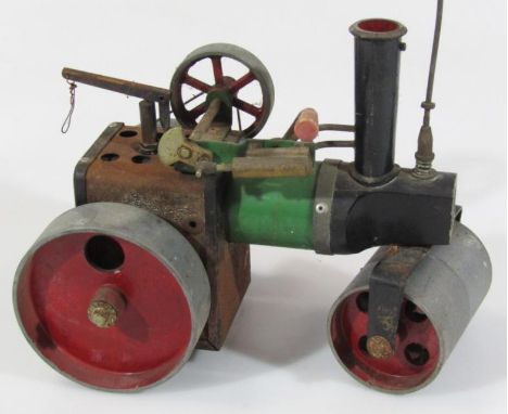 A mid 20thC Mamod steam roller, with articulated action and wire funnel top, 38cm high.