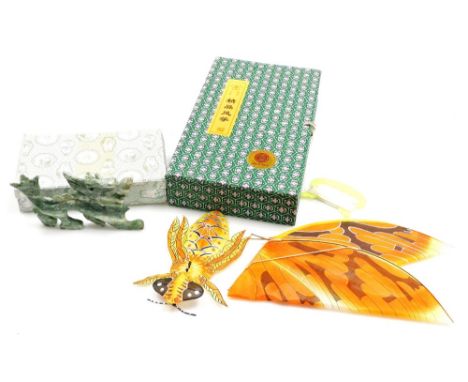 A Chinese jade carving of a dragon, 15cm long, in presentation box, and a butterfly paper kite, 27cm long, in presentation bo