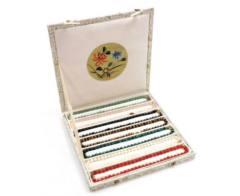 A set of seven gemstone beaded necklaces, comprising carnelian, malachite, rose quartz, eventurine, tigers eye, white peking 
