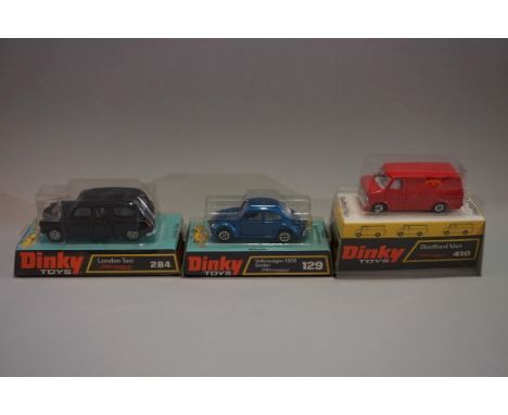 Three Dinky 'Speedwheels' vehicles, comprising: 129 'Volkswagen 1300 Sedan'; 284 'London Taxi'; and 410 'Bedford Van', each i