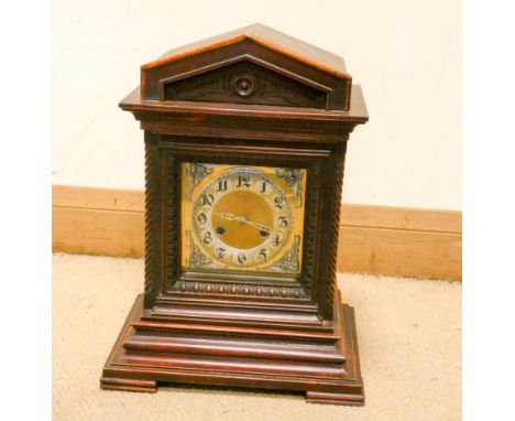A large Edwardian bracket clock with striking movement with brass and silver dial in a mahogany case, 18" high X 13" wide 