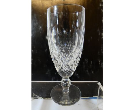 A set of six Waterford Crystal Colleen pattern champagne flutes together with a Waterford crystal mantle clock and a copy of 