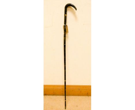 A decorative bone walking stick 