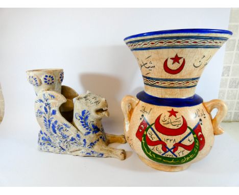 An Ottoman Mosque lamp vase and a Persian lion shaped vase 