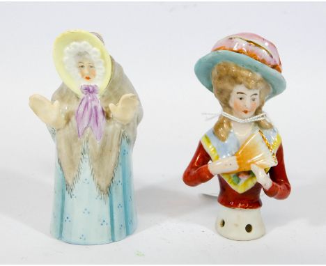 A Royal Worcester candle snuffer and a 19th Century pin cushion doll 