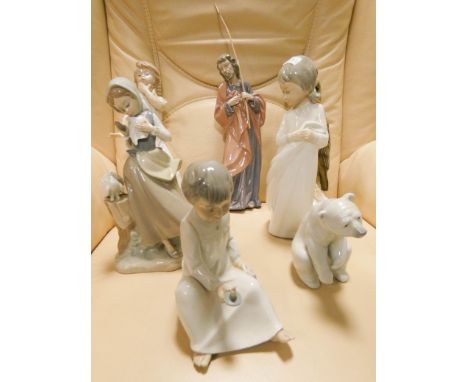 Two Lladro figurines, four Nao figurines and a porcelain owl figure 