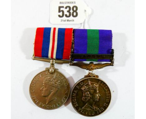 A pair of campaign medals awarded to J F Nicholson of the Royal Electrical Mechanical Engineers, medals comprise of The War M
